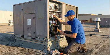 Technician performing HVAC system maintenance